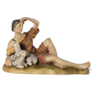 Pastore sdraiato con pecore