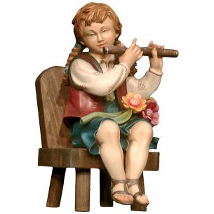 Flute player sitting and chair