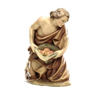 Pastore inginocchiato con frutta