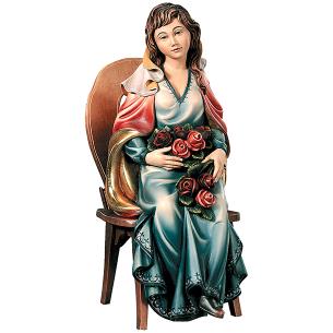 Donna seduta con rose