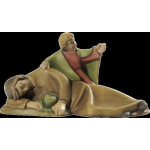 Pastore sdraiato con bambino