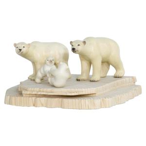 Group of 4 polar bears on ice platform