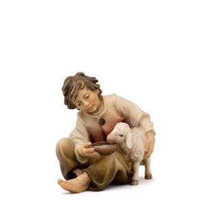 Child with sheep
