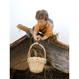 Bambino con cestello