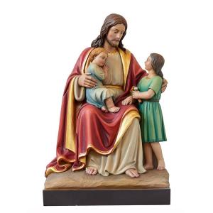 Jesus sitting with two children