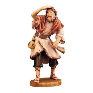 Pastore con mano alla fronte e corno