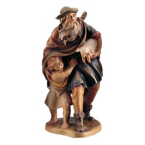 Padre con figlio e agnello