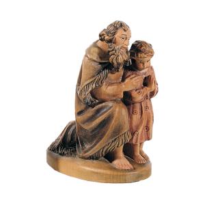 Shepherd kneeling with child