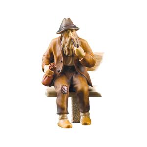 Uomo seduto con panca