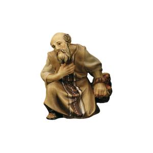 Shepherd kneeling with basket