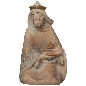 Re magio inginocchiato