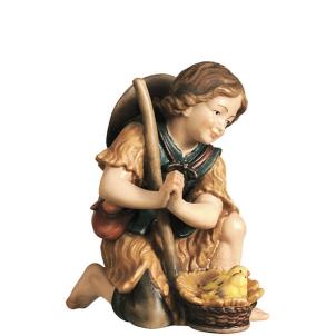 Shepherd child kneeling