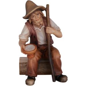 Pastore seduto con sale