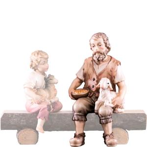 Pastore seduto con agnello H.K.