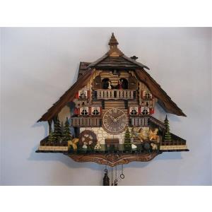 Quartz cuckoo clock with music and dancing couple