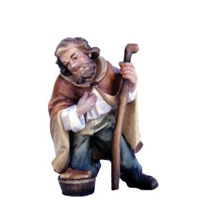 pastore inginocchiato