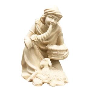 Pastore in ginocchio con cesto