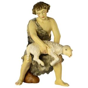 Hirte gebeugt mit Schaf