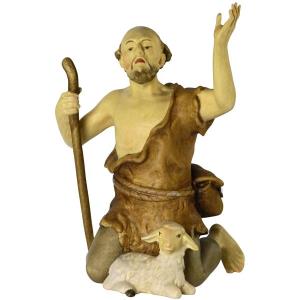 Hirte kniend mit Lamm