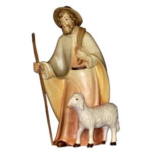 Shepherd with hat and sheep standing