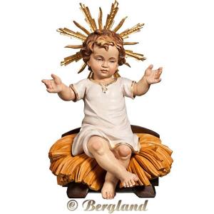 Jesus Child clothed sitting with cradle