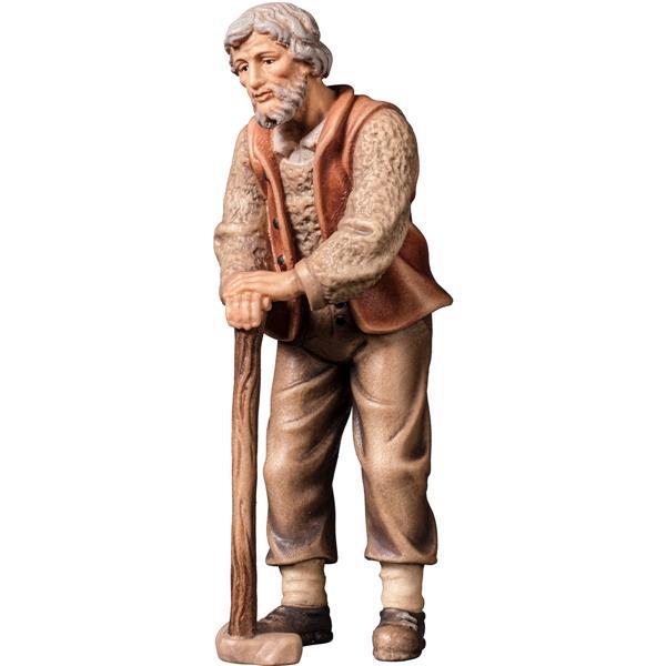 A-Old farmer leaning on walking stick - color