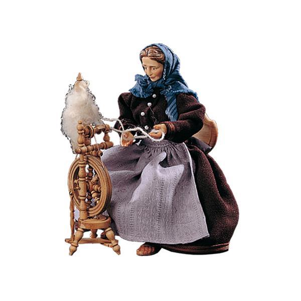 Woman with spinning wheel - color